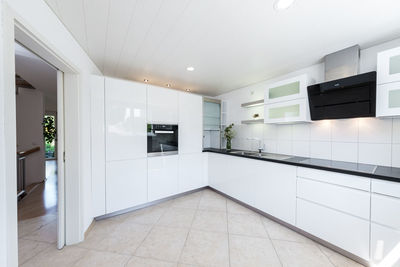 Interior of modern white kitchen