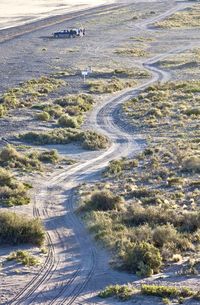 High angle view of road amidst land