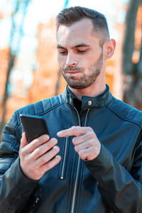 Young man looking at camera