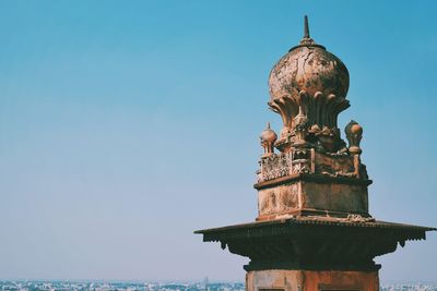 Statue of temple against clear sky