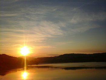 Scenic view of mountains at sunset