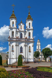 Low angle view of building against blue sky