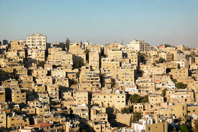 High angle shot of townscape against clear sky