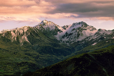 Scenic view of mountains against sky during sunset