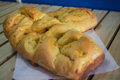 High angle view of bread on cutting board