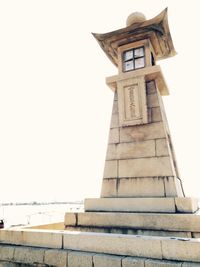 Low angle view of built structure against clear sky