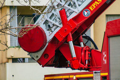 Low angle view of red telephone booth