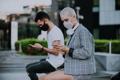 Man sitting on mobile phone