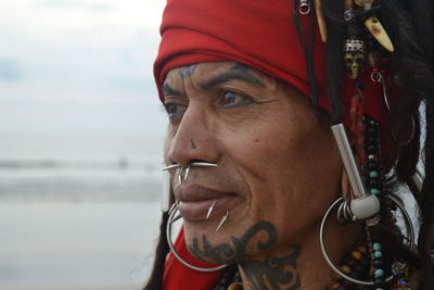 Close-up of man wearing traditional clothing