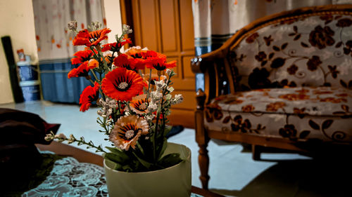 Close-up of flower pot on table at home