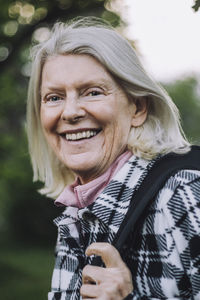 Portrait of happy senior woman with white hair