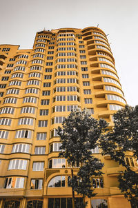 Low angle view of buildings against clear sky