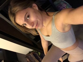 High angle portrait of woman at home