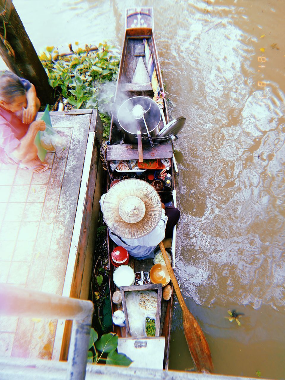 HIGH ANGLE VIEW OF FOOD IN BOAT AT RIVER