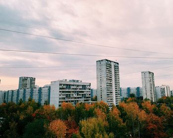 Low angle view of modern buildings against sky