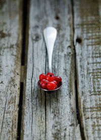 Close-up of red currant in spoon