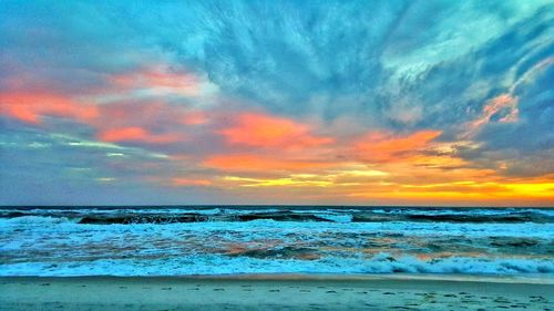 Scenic view of sea against sky during sunset