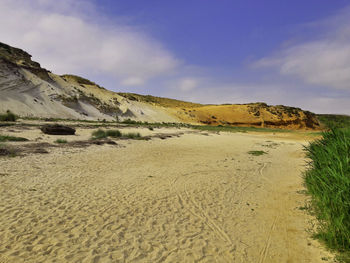 Scenic view of beach against sky