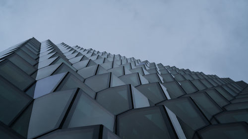 Low angle view of modern building against sky