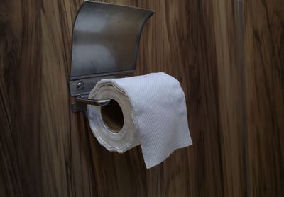 Close-up of open door on wood at home