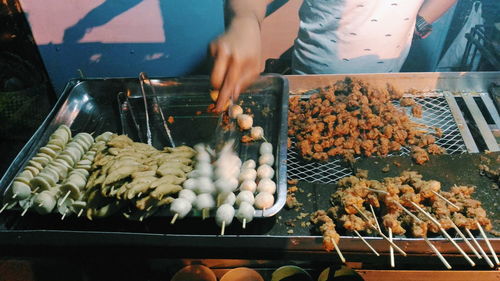 Midsection of woman having food