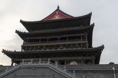 Low angle view of temple building against sky