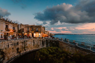 Panoramic view of ortigia with fonte aretusa and lungomare alfeo  during sunset