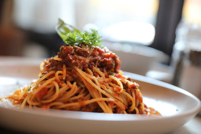 Close-up of noodles in bowl on table