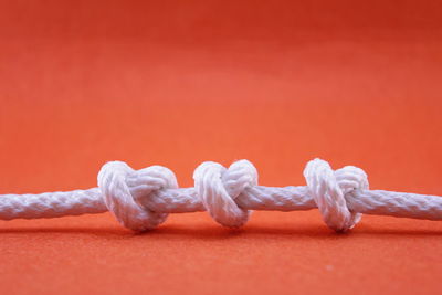 Close-up of rope tied on metal