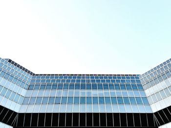 Low angle view of modern building against clear sky