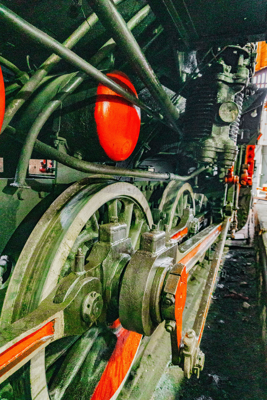 CLOSE-UP OF RED MACHINERY