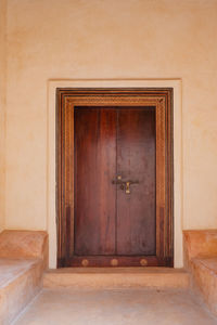 Traditional ornate carved wooden door in lamu town, unesco world heritage site in kenya