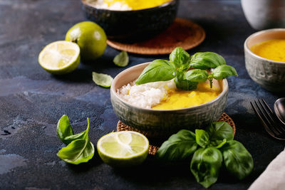 Close-up of fruits in bowl on table