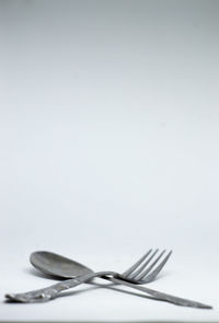 High angle view of container on table against white background