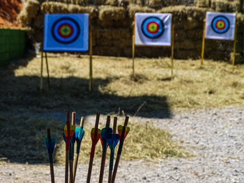 Multi colored targets an arrows on field