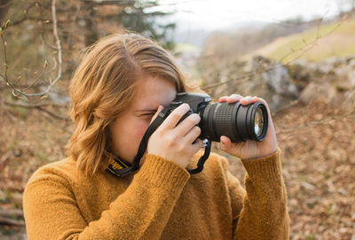 Photographer photographing camera