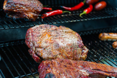 Close-up of meat on barbecue grill
