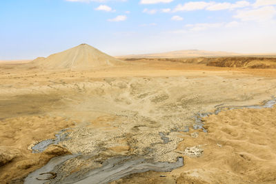 Scenic view of desert against sky