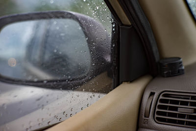 Close-up of wet car window