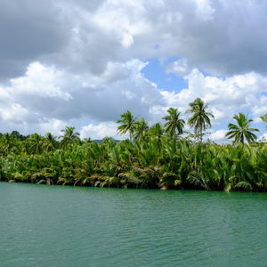 Scenic view of sea against cloudy sky