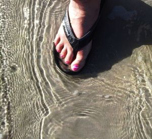 Reflection of people in water