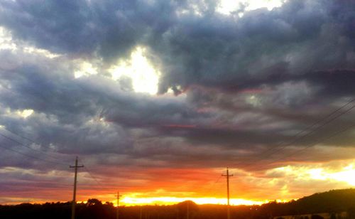 Scenic view of dramatic sky during sunset