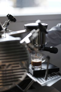 Close-up of coffee cups in cafe