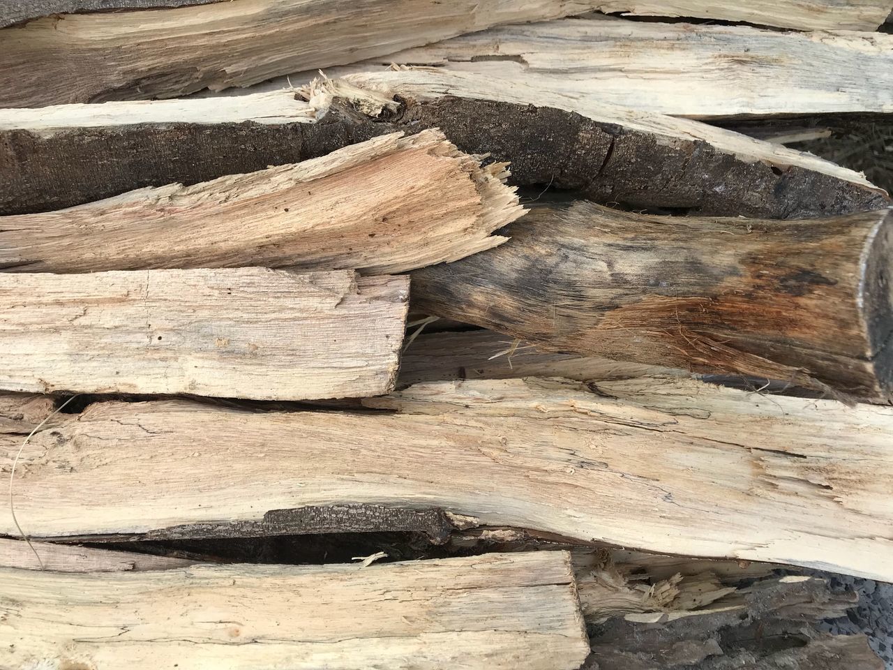 CLOSE-UP OF LOGS STACK
