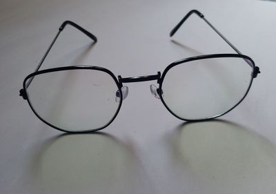 Close-up of eyeglasses on table