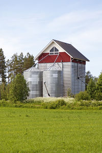 House with two silos connected