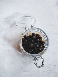 High angle view of fruits in jar on table