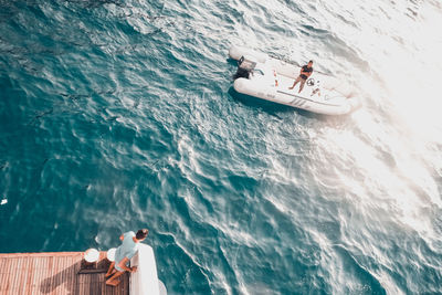 People on boat in sea