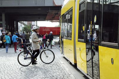 Man cycling on bicycle in city
