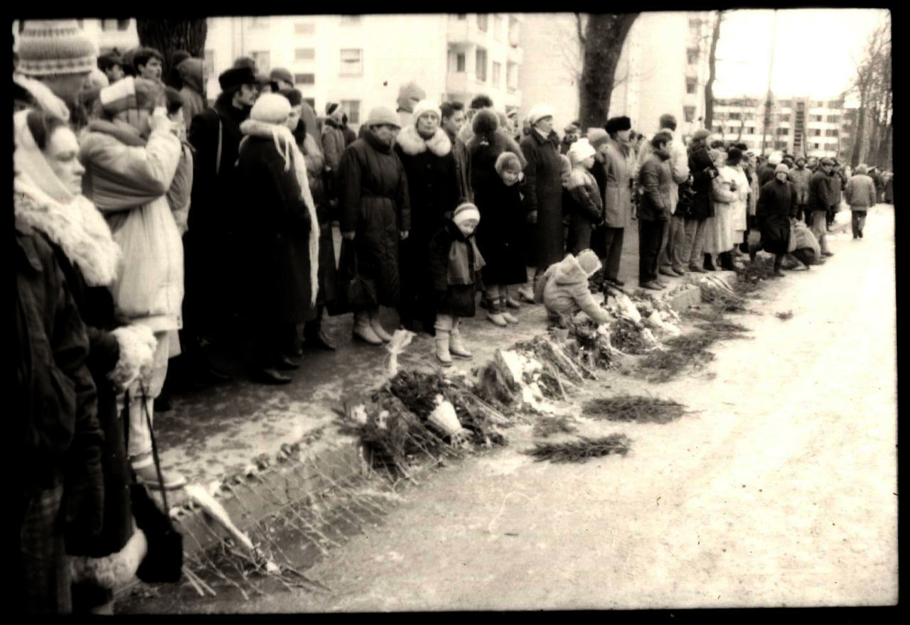 GROUP OF PEOPLE IN THE STREET